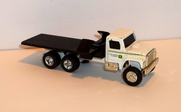 John Deere flatbed truck for farm implements -view from right side